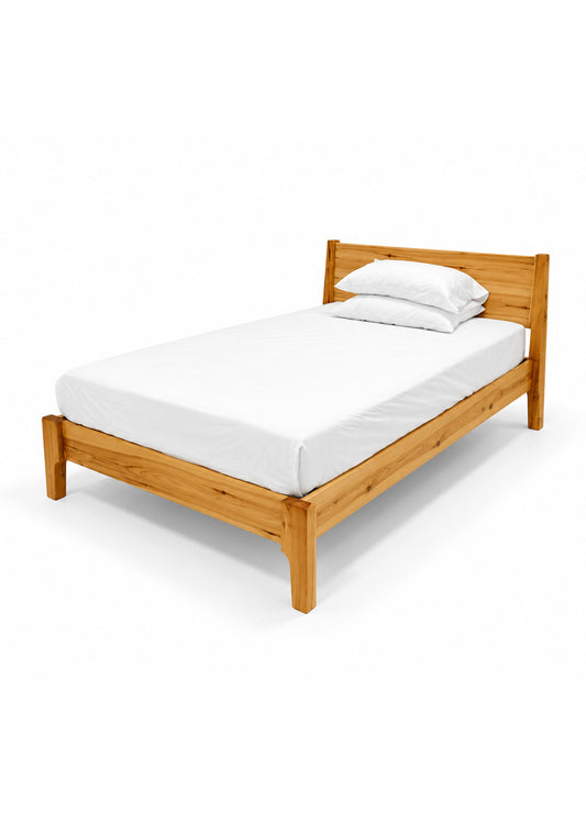 A single wooden bed frame with a natural light oak finish, shown with a white mattress and two white pillows on a clean white background.