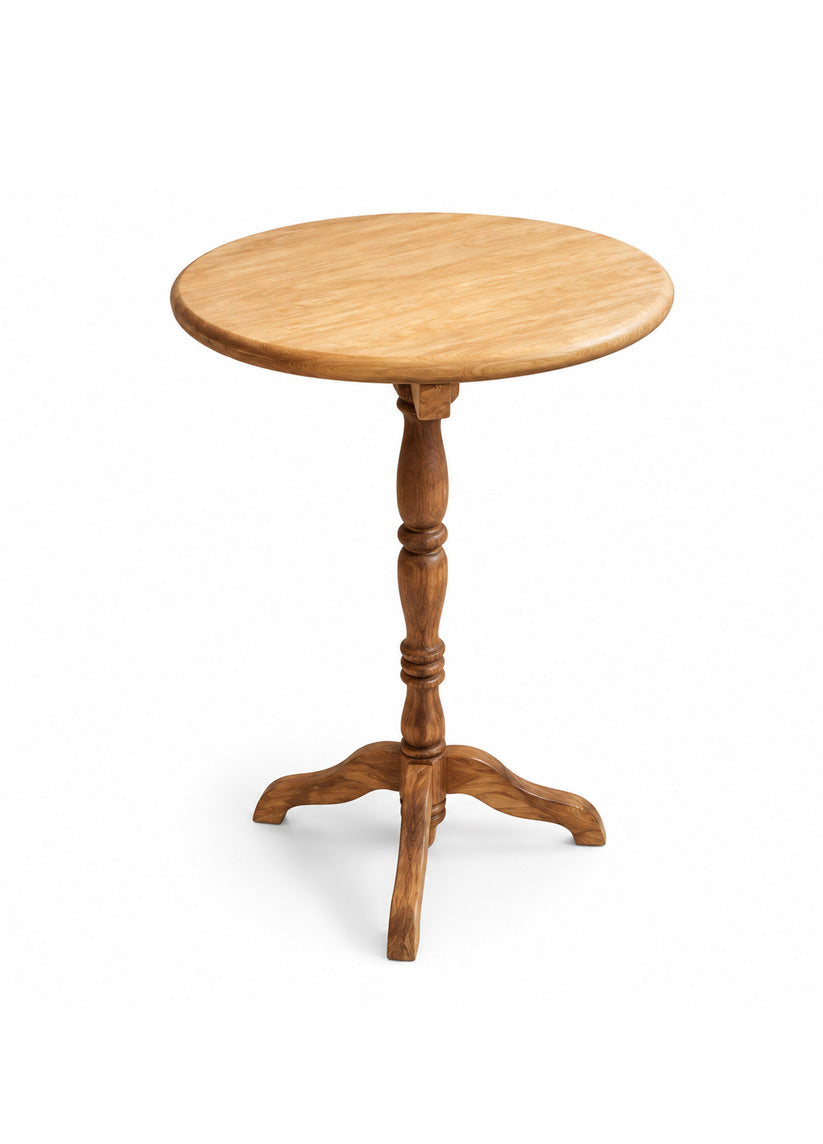A round wooden side table with a natural oak finish, featuring a turned pedestal base with three curved legs, shown on a white background.