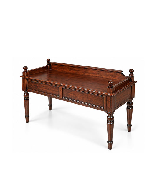 A dark reddish-brown wooden writing desk with turned legs, decorative finials on the apron corners, and two front drawers, shown on a clean white background.
