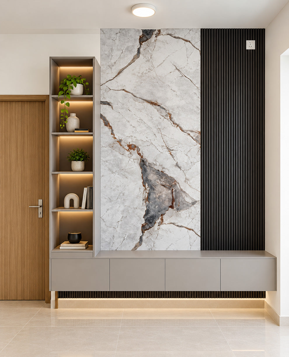 Modern interior wall paneling featuring a large white marble-look tile with brown veining, a vertical black ribbed panel, and a matching floating cabinet below, shown in a styled room with shelving and a wooden door.